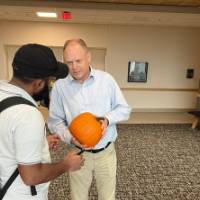 Associate Dean teaching how to carve!